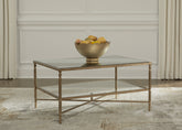 Bay Furniture Gallery - Ashley Furniture - Cloverty Coffee Table - Rectangular Cocktail Table / Aged Gold Finish - T440-1